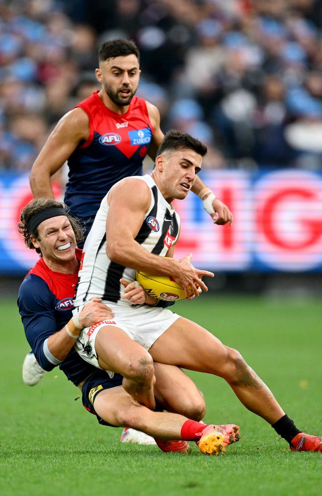 Nick Daicos is tackled by Ed Langdon. Picture: Getty Images