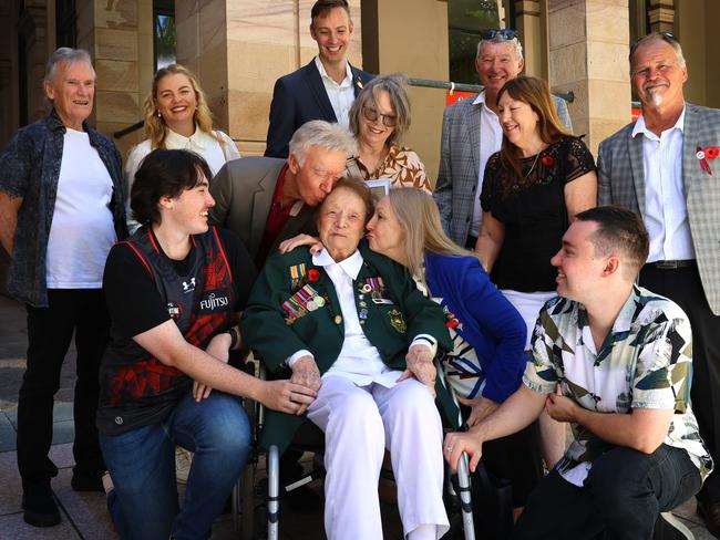 Cynthia Clifford, 100, and her family. She was the sole WW2 veteran left to lead Brisbane's ANZAC March. She was an anti-aircraft gunner stationed in Freemantle, WA, to protect Australia's coastline.Family pictured are -Back: Don Rodiger, Danica Clifford, Brandt Clifford, Colin Clifford, Scott ForrestMiddle: Noel Clifford, Roslyn Forrest, Valerie CliffordFront: Teal Rodiger, Cynthia Clifford, Cheryl Clifford, Kynan RodigerPicture: Mackenzie Scott / The Australian