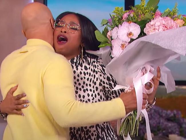 Common arrived for his TV interview with a bouquet of flowers for Jennifer Hudson.