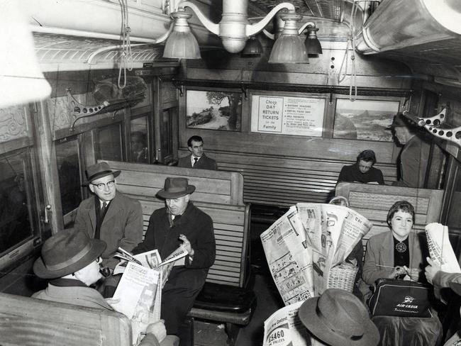 1958: passengers ride in a second class Tait “red rattler” carriage on their way to the city. Picture: HWT Library