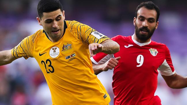 AL AIN, UNITED ARAB EMIRATES - JANUARY 06: Tom Rogic of Australia is challenged by Baha' Faisal of Jordan during the AFC Asian Cup Group B match between Australia and Jordan at Hazza Bin Zayed Stadium on January 06, 2019 in Al Ain, United Arab Emirates. (Photo by Francois Nel/Getty Images)