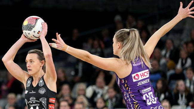 Nat Medhurst of the Magpies (left) contests with Kim Jenner of the Firebirds during the Round 9 Super Netball match last weekend. Picture: AAP Image/Hamish Blair