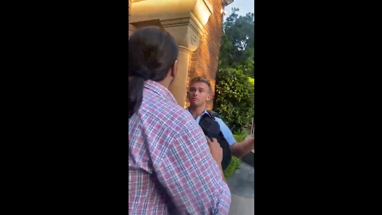 Police stopped the man from entering the church for mass, despite his protests.