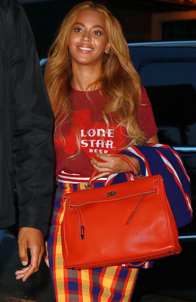 Beyonce wears a tartan patterned skirt and a Lone Star Beer shirt while out and about in NYC. Pictured: Beyonce Ref: SPL1031537 190515 Picture by: XactpiX / Splash News Splash News and Pictures Los Angeles: 310-821-2666 New York: 212-619-2666 London: 870-934-2666 photodesk@splashnews.com
