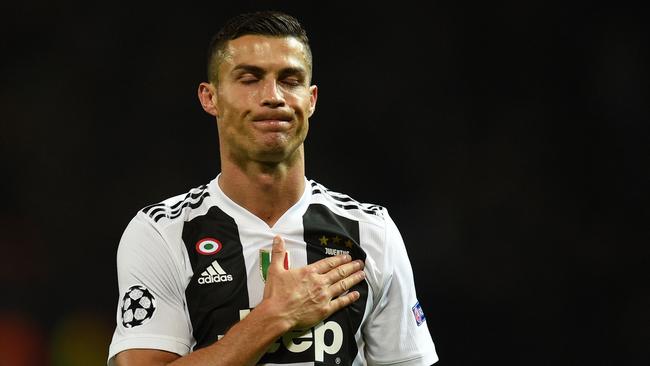 Cristiano Ronaldo gestures to supporters at Old Trafford. Picture: AFP