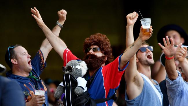 Members of the Barmy Army are seen cheering on Day 4 of the first Ashes Test.