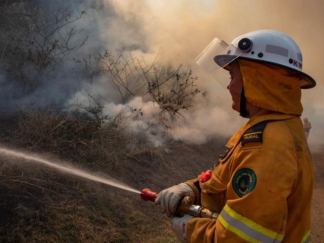 Generic photo of rural firey tackling a bushfire