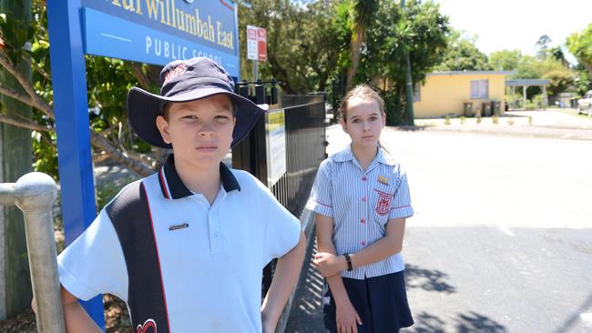 Murwillumbah East Public School students Isaac Rose, Year 6, and Zoe Johnson, Year 5, are unhappy with the state government's plans to merge four schools into one mega-facility. Picture: Liana Boss