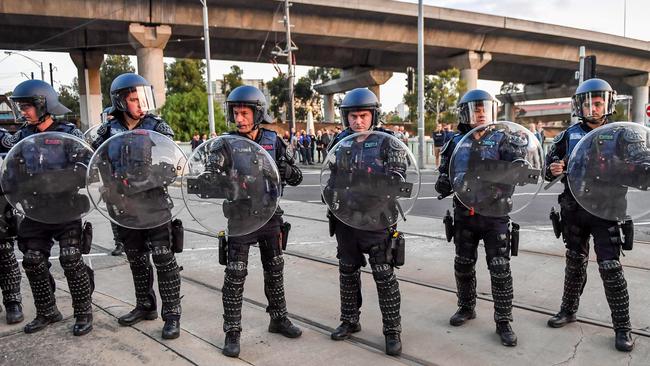 Police were decked out in riot gear to disperse protesters. Picture: Jake Nowakowski