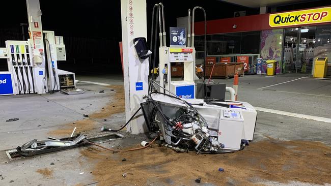 The petrol bowser knocked out of the ground.