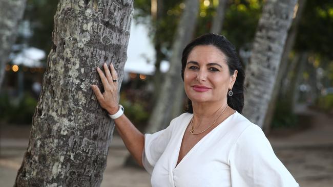 Cairns. Travel agent Mercedes Gonzales at Palm Cove beach, Cairns. PICTURE: BRENDAN RADKE