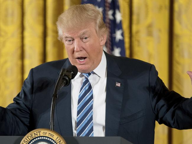 President Donald Trump speaks during a White House senior staff swearing in ceremony in the East Room of the White House, Sunday, Jan. 22, 2017, in Washington. (AP Photo/Andrew Harnik)