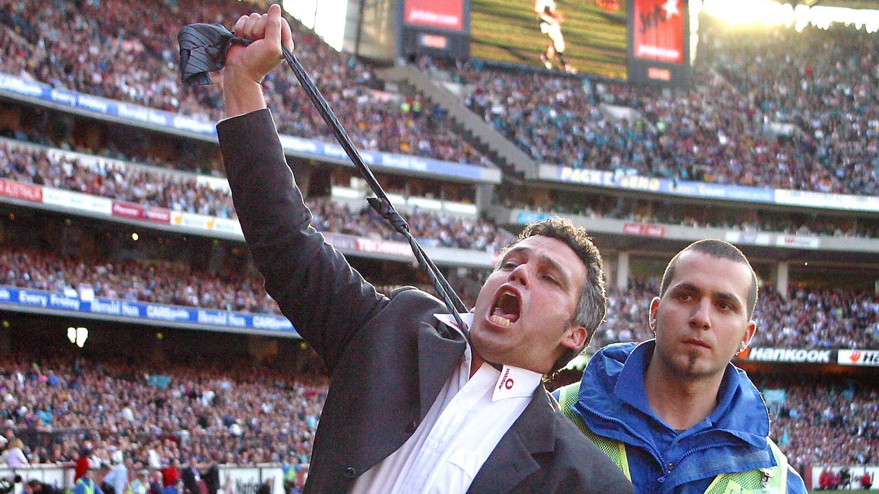 Mark Williams shows the crowd Port is no choker after the 2004 Grand Final. Picture: Fiona Hamilton