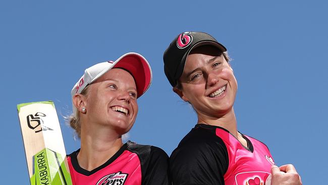 Perry is close friends with her now-national captain Alyssa Healy (left), having grown up together and captained each other at domestic level. Picture: Brett Costello