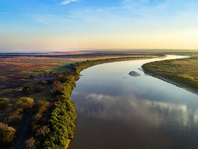 Sun rises over East Alligator River in Kakadu, Tuesday, July 23, 2019Picture: KERI MEGELUS