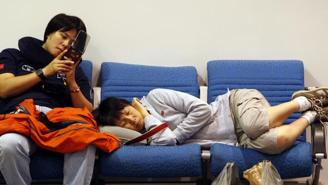 Planes scheduled to land at Cairns Domestic Airport were diverted to Townsville after an instrument failed in Cairns. Tired passengers wait to catch planes after being delayed for hours.