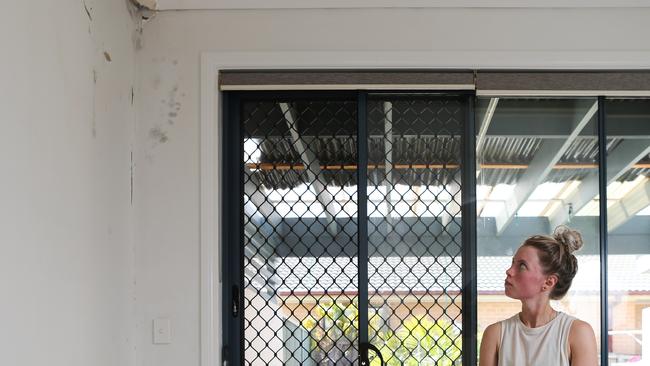 Lara Smith said there were numerous leaks in her unit just two months after moving in. Picture: Gaye Gerard