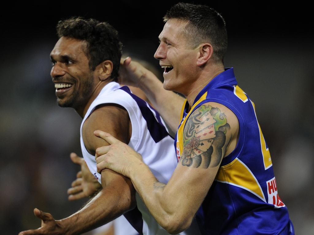 Scott Chisholm shares a laugh with boxer Danny Green during the Chris Mainwaring tribute match for Telethon in 2008.