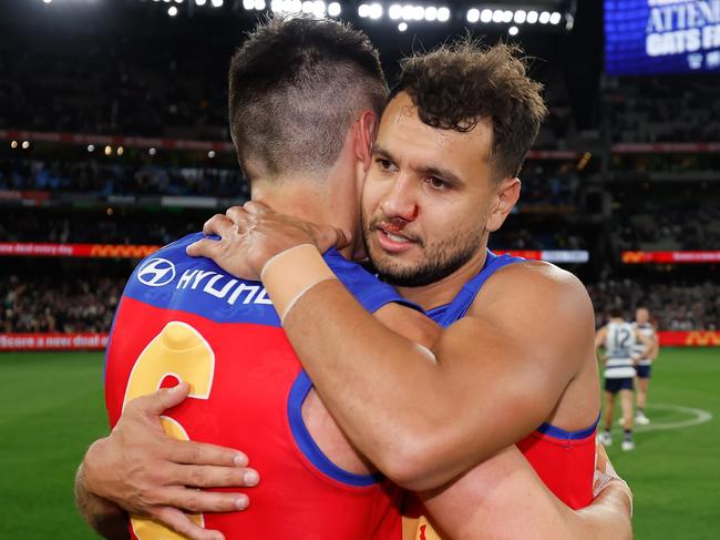 MELBOURNE, AUSTRALIA - SEPTEMBER 21: Hugh McCluggage and Callum Ah Chee of the Lions celebrate during the 2024 AFL Second Preliminary Final match between the Geelong Cats and the Brisbane Lions at The Melbourne Cricket Ground on September 21, 2024 in Melbourne, Australia. (Photo by Dylan Burns/AFL Photos via Getty Images)