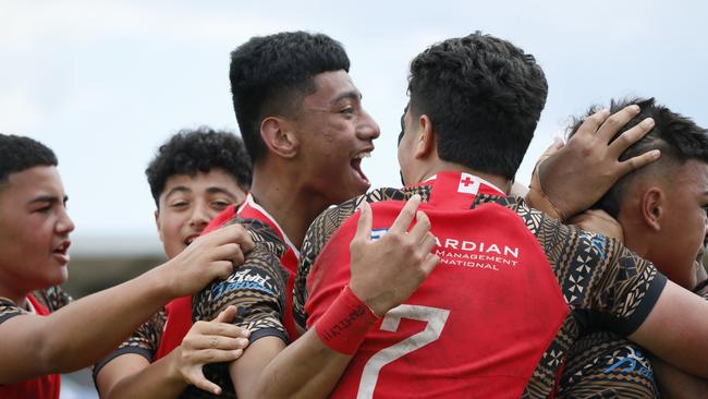 Celebrations in the under 14 boys Tonga v Samoa match.