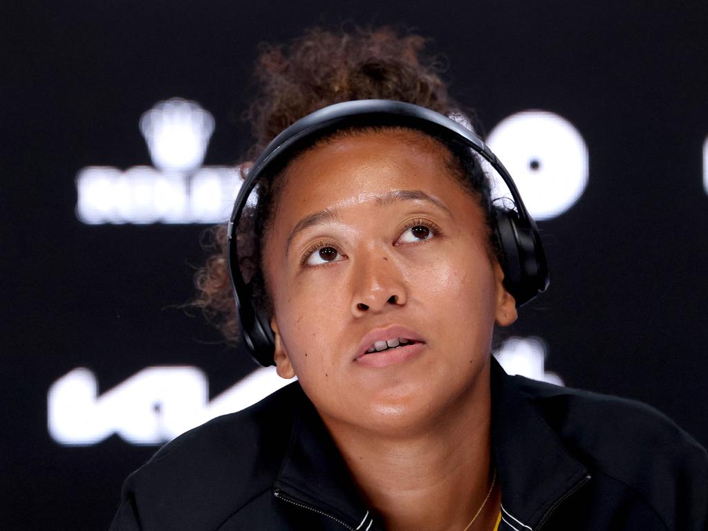 Osaka speaking to the media after her latest withdrawal. (Photo by DAVID GRAY / AFP)