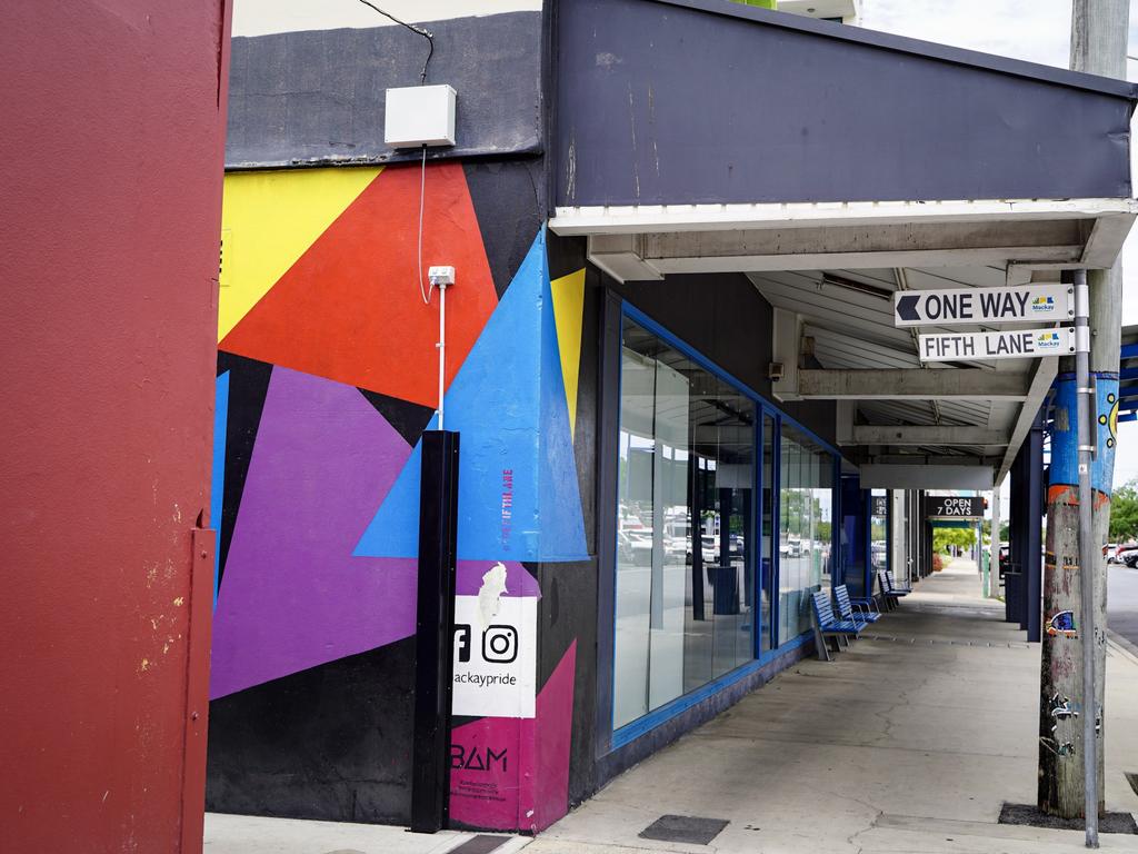 The colourful Fifth Lane provides a sharp contrast to the empty Rivers building in Mackay's CBD. Picture: Heidi Petith