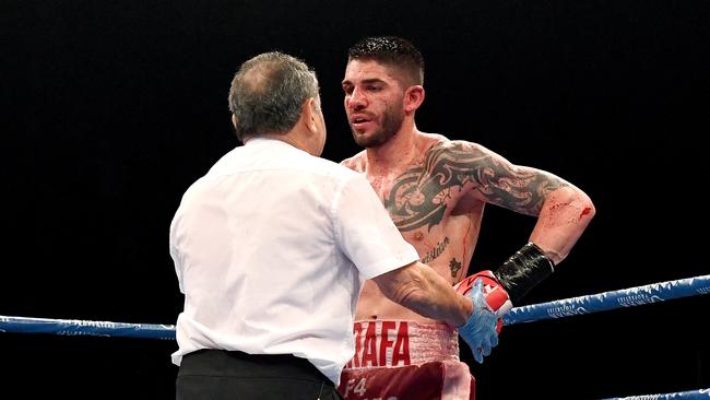 BRISBANE, AUSTRALIA - DECEMBER 18: Michael Zerafa gets a standing count during the middleweight bout between Jeff Horn and Michael Zerafa at Brisbane Convention & Exhibition Centre on December 18, 2019 in Brisbane, Australia. (Photo by Bradley Kanaris/Getty Images)