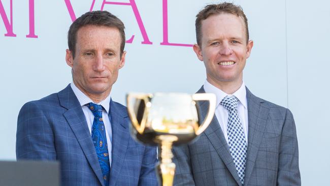 Jockeys Damien Oliver (left) and Kerrin McEvoy both have their sights set on a record-equalling fourth Melbourne Cup victory. Picture: Getty Images