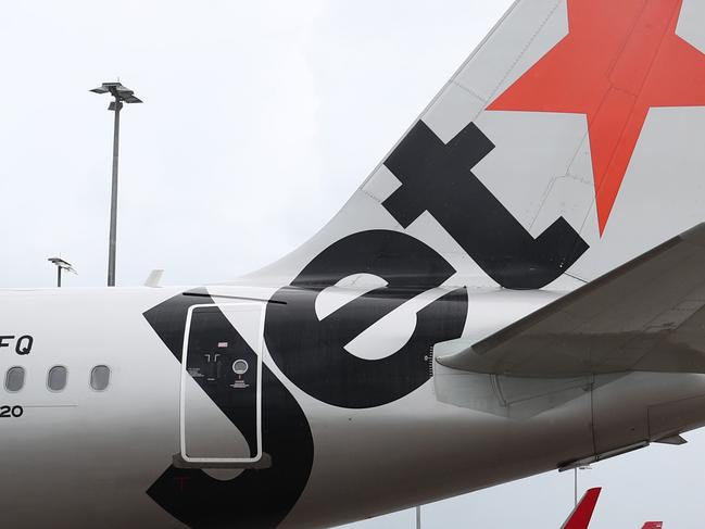 A Jetstar Airbus A380 and Qantas Boeing 737-800  jet aircraft at Cairns Airport after touchdown, bringing tourists and tourism dollars to Far North Queensland. Picture: Brendan Radkeescape december 6 2020 doc holiday