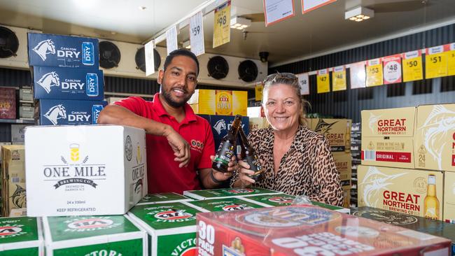 BWS Nightcliff beer man Anil Sharma and customer Suzie Bee yesterday, after news that Dan Murphy’s has proposed a new location further away from the Bagot Rd/Osgood Drive intersection. Picture: Che Chorley