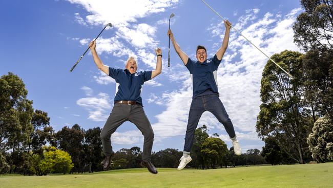 Kew's Michael Adams and Fitzroy North’s Adam Faithfull celebrate their freakish back-to-back hole in ones. Picture: David Geraghty