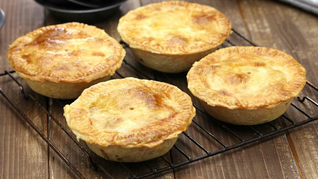 Harry Vernon Samual Frank, 31, reached under the security screen at the Cairns North Coles Express at 1am one January morning, twice throwing two pies from the store at the shop attendant.