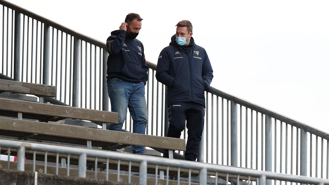 Clarkson and Mitchell make their way down to the press conference. Picture: Michael Klein