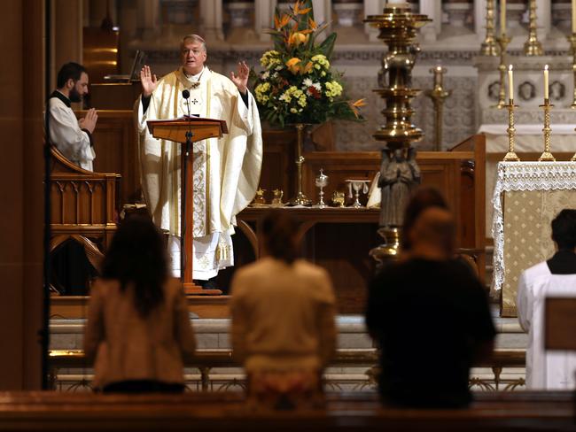 17/05/2020. Archbishop Anthony Fisher officiating the first mass in two months at St Marys since the coronavirus shutdown. The pandemic sermon was delivered to a socially distanced group of ten parishioners. Jane Dempster/The Australian.