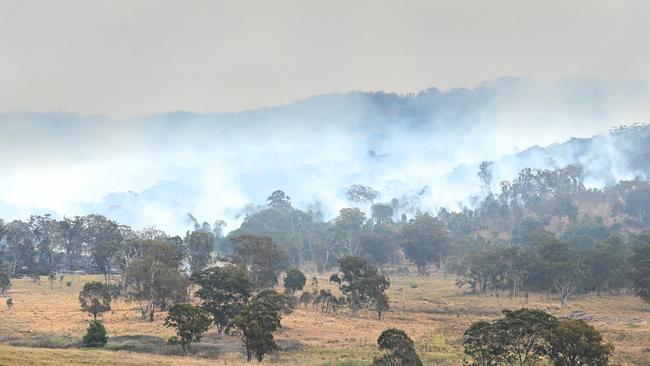 Firefighters are hoping cooler temperatures will help ease tough fire conditions. Picture: NCA NewsWire / John Gass