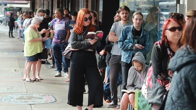 People queue at Centrelink at Marrickville in Sydney. Picture: John Feder