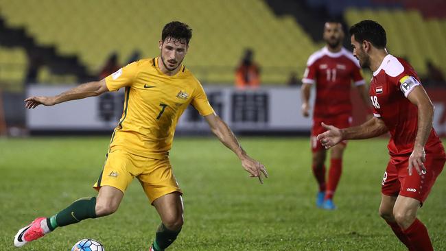 Mathew Leckie of Australia controls the ball