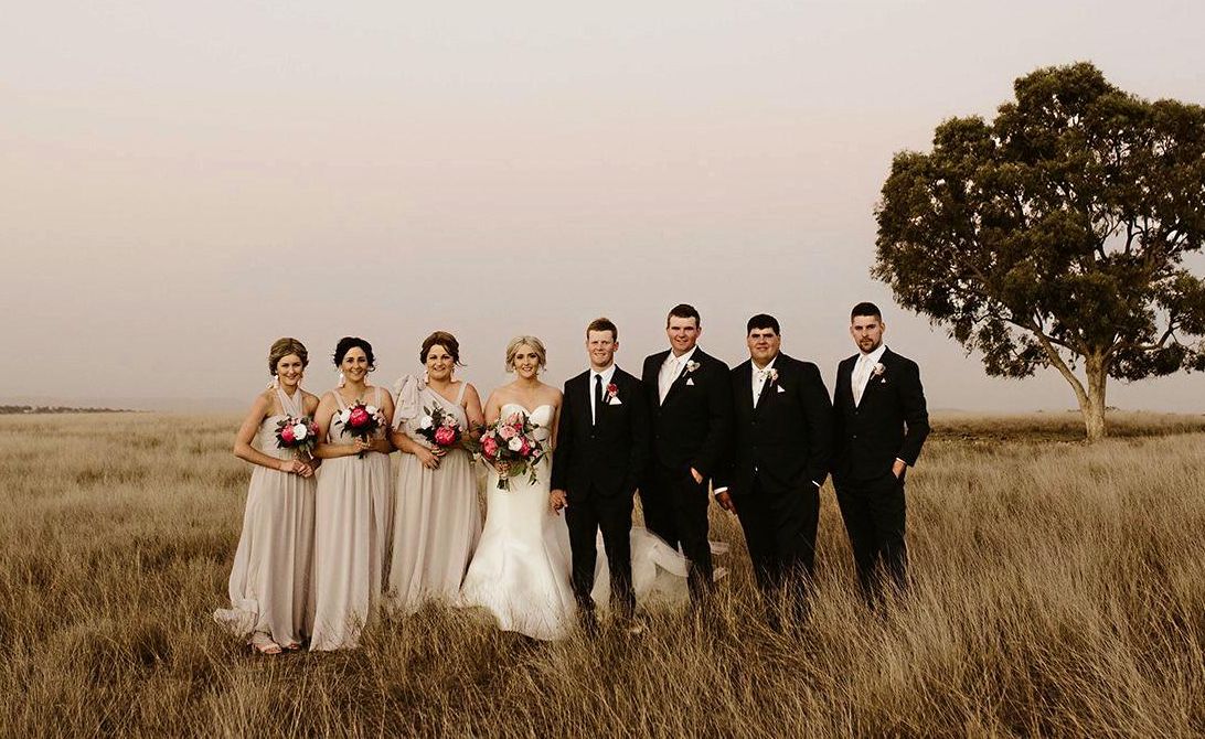 The bridal party with Shelbi and Mitch on their wedding day. Picture: Leah Cruikshank