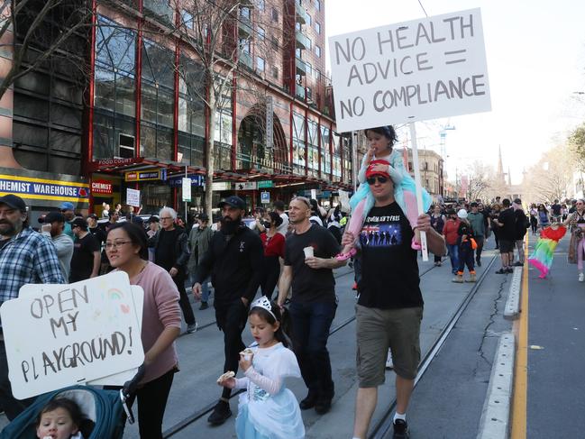 Anti-lockdown protesters march through Melbourne’s CBD. Picture: David Crosling