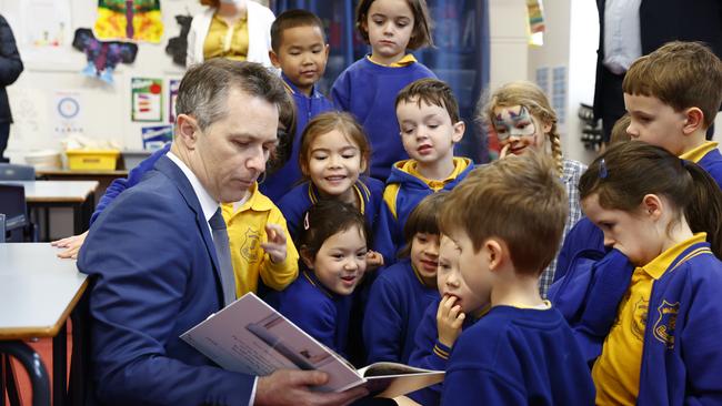 Education Minister Jason Clare reads to a kindergarten class at Marrickville Public School in Sydney. Picture: Richard Dobson