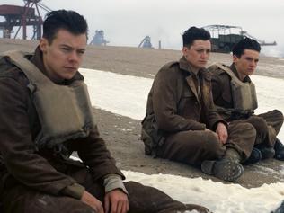 This image released by Warner Bros. Pictures shows Harry Styles, from left, Aneurin Barnard and Fionn Whitehead in a scene from "Dunkirk."  (Warner Bros Pictures via AP)