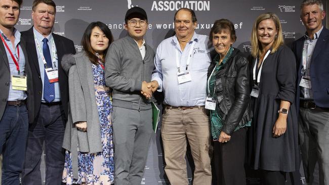 The teams from Yulong and Sunnyside at last night's Australian Wagyu Association auction, which saw a heifer sold to a new record high at last night’s multimillion dollar auction.