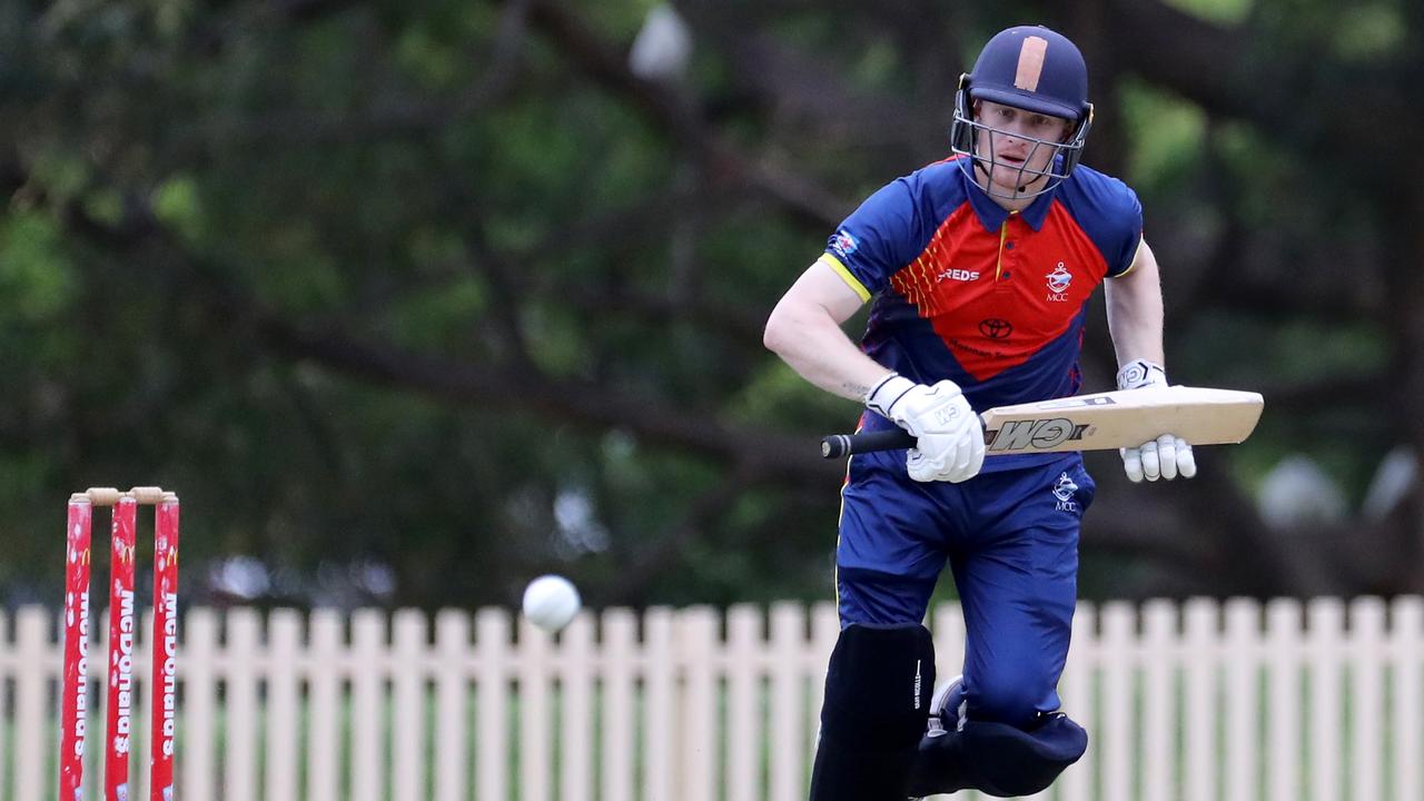 Jordan Cox hits a ball through the covers for Mosman.