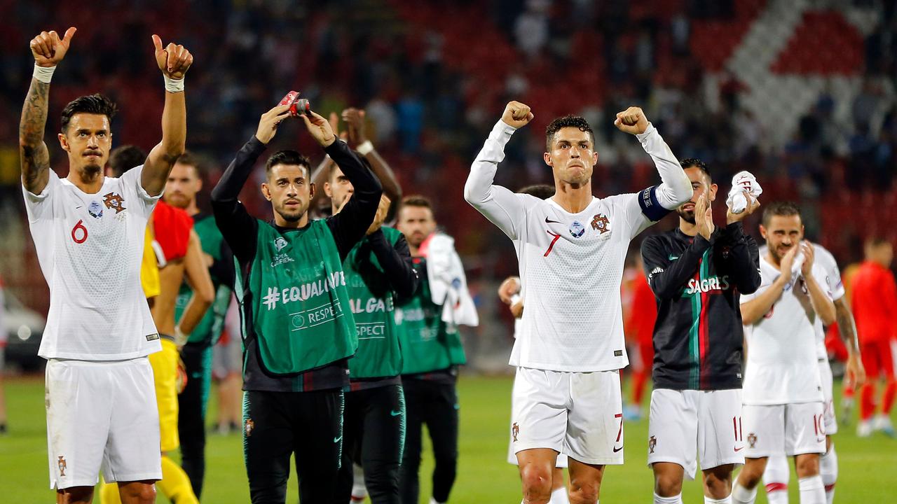 Ronaldo was feeling pumped after Portugal beat Serbia to get off the mark in Euro 2020 qualifying. (Photo by PEDJA MILOSAVLJEVIC / AFP)