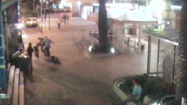 Assault by Finks bikie members in Broadbeach Mall. Dion Pydde (light top, centre) stomping on the fallen victim.