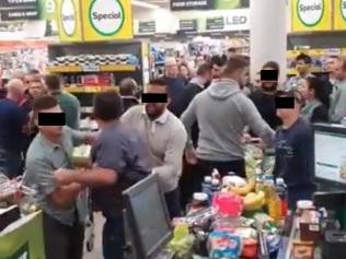 Assault charges after Woolies brawl