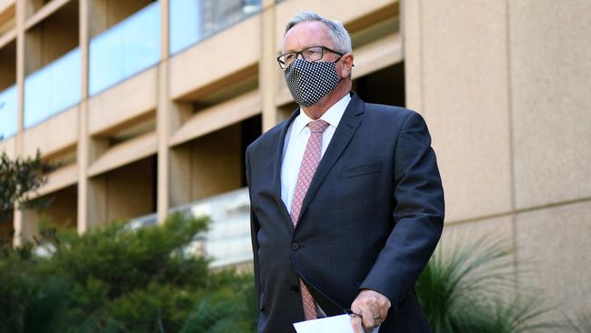 NSW Health Minister Brad Hazzard arrived to speak to media with a mask message. Picture: NCA NewsWire/Joel Carrett