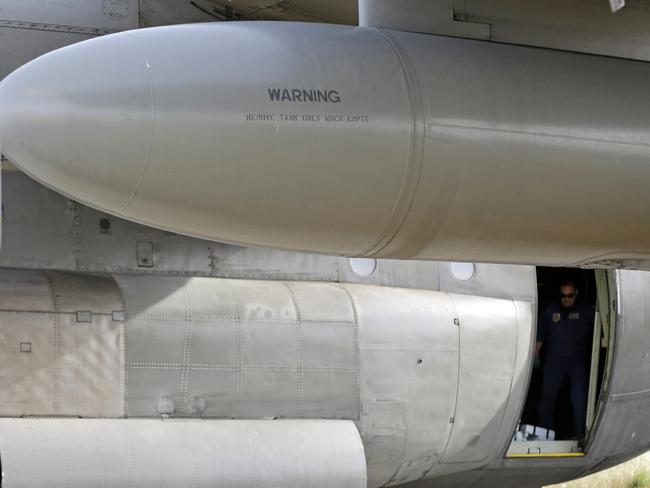 An engineer inspects a C-130 HAUL of the Hellenic air force, which took part and now is on stand by, in the searching operation of the missing Egypt plane, at the military air base of Kastelli on the southern Greek island of Crete. Picture: Photo/Thanassis Stavrakis