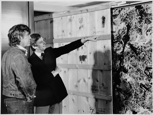 Robert Hughes , left, and James Mollison with Jackson Pollock’s Blue Poles in 1952, © Pollock-Krasner Foundation. ARS/Copyright Agency