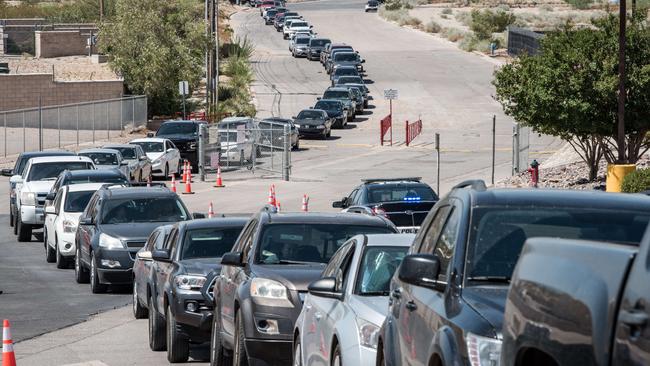 Hundreds of drivers line up for coronavirus tests at a newly opened mega drive-through site at an El Paso football stadium in Texas. Picture: AFP